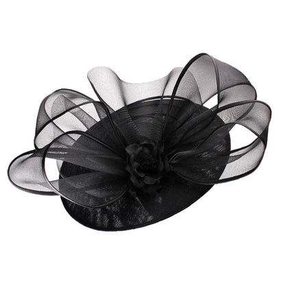 Beautifully crafted fascinator hat showcasing an array of floral decorations, a must-have for women seeking to make a statement at social gatherings.
