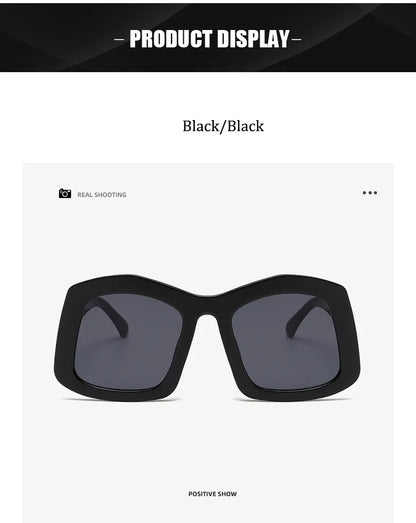 Luxury women's oversized square sunglasses in a vibrant orange gradient design with UV400 protection and durable polycarbonate frame.