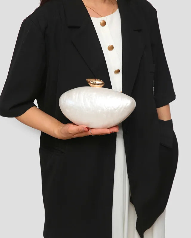 Elegant acrylic evening bag for women with a chic ellipse design, perfect for weddings and parties.