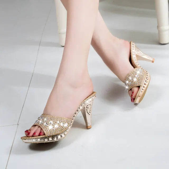 Elegant women's rhinestone high heels sandals in gold, featuring open back and spike heels, perfect for parties.