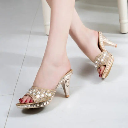 Elegant women's rhinestone high heels sandals in gold, featuring open back and spike heels, perfect for parties.