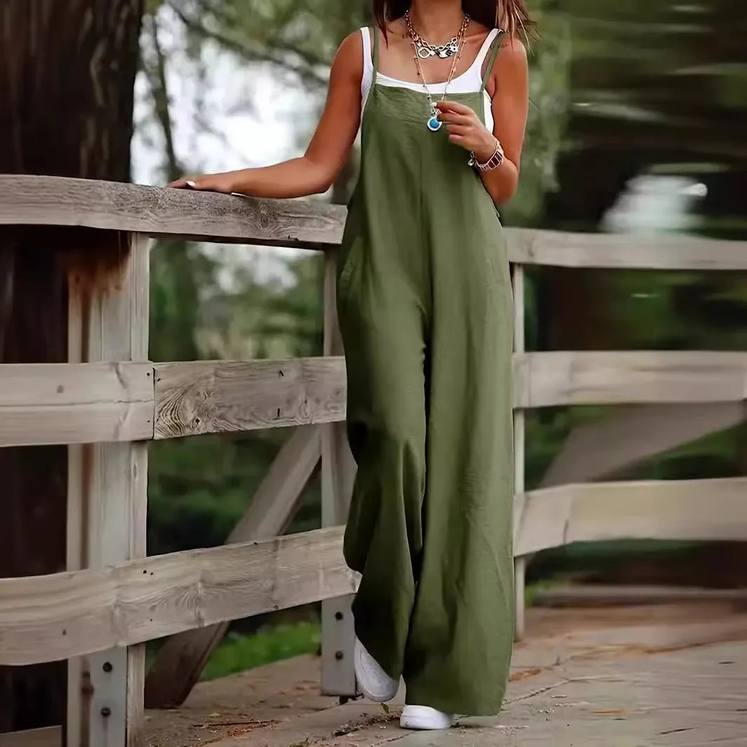 Chic Plus Size Women's Jumpsuit featuring Functional Pockets, Stylish Loose Fit, Ideal for Casual Streetwear or Elegant Occasions.