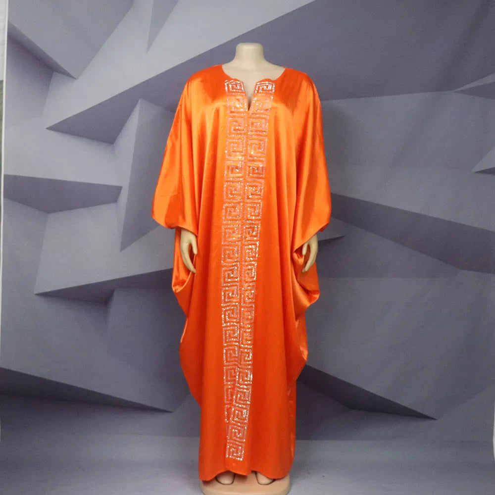 Stylish long sleeve V-neck maxi dress for plus size women, epitomising elegance and grace in a traditional Muslim design.