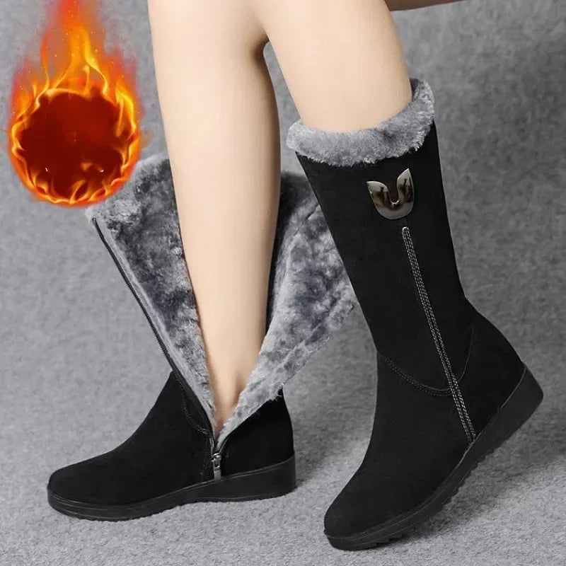 Elegant women's winter boots featuring a warm faux suede design, mid-calf height, side zipper closure, and soft plush lining, perfect for stylish winter outings.