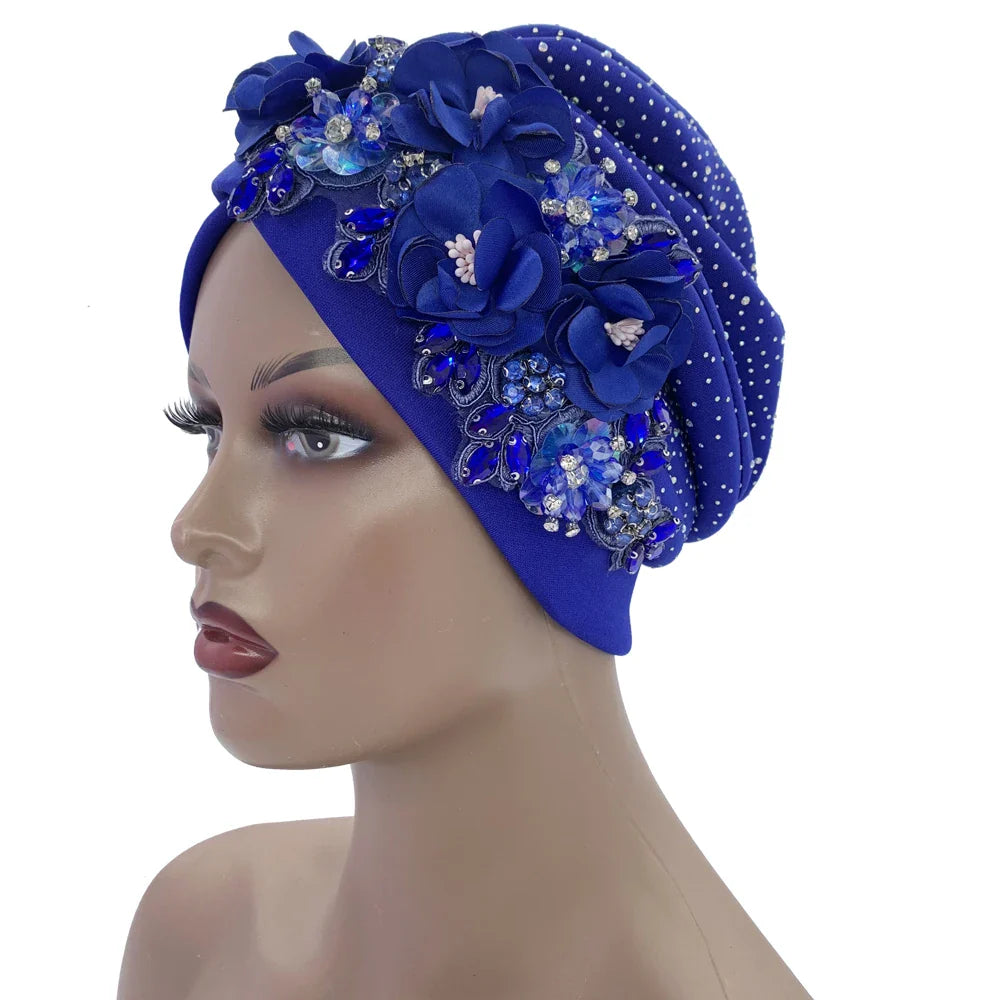 Luxurious African turban cap showcasing exquisite rhinestone embellishments, designed for modern women seeking a chic and sophisticated head wrap.