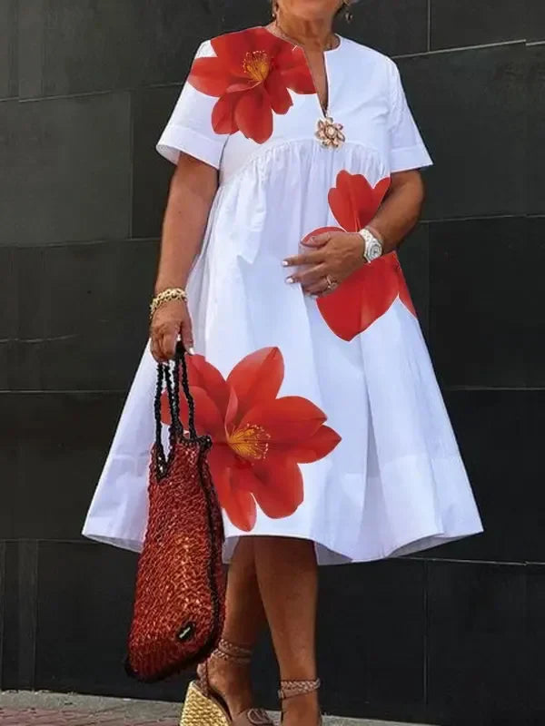 Chic Deep V-Neck Modigirl Plus Size Midi Dress for Women, Showcasing a Beautiful Floral Design and Short Sleeves for Effortless Style.