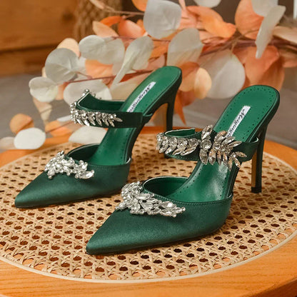 Luxury summer sandals for women, featuring a low thin heel and rhinestone embellishments on silk, designed for comfort and elegance.