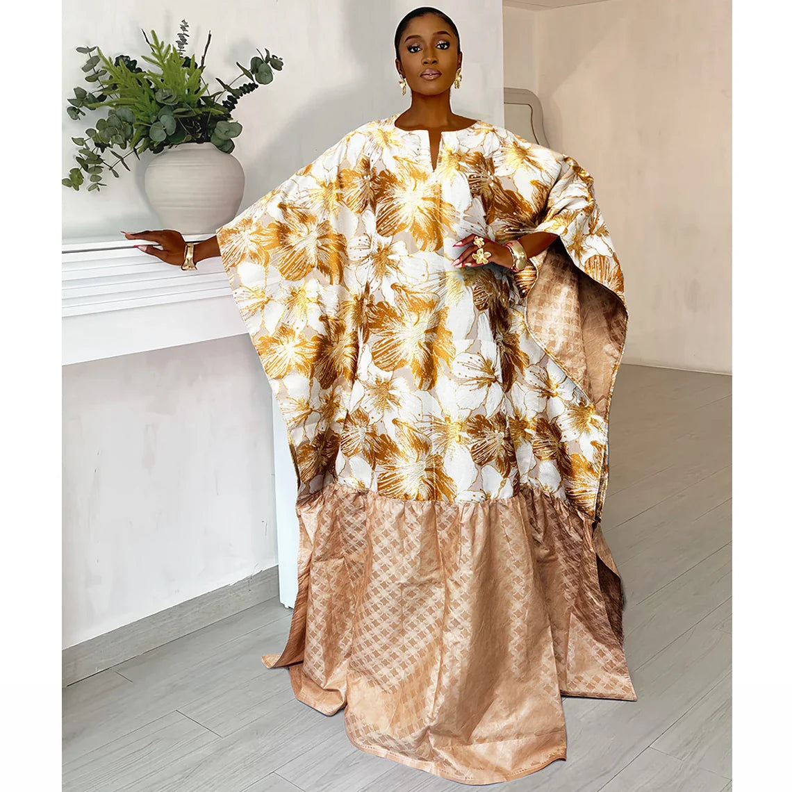 Luxury African women brocade boubou dress showcased in vibrant green and gold bazin riche fabric, perfect for parties and weddings.