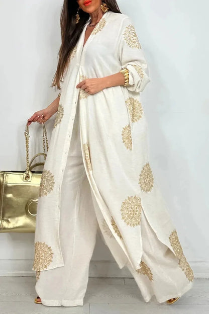 Elegant women's loose long vintage printed robe set featuring a button shirt and wide leg pants, designed for a luxurious spring/summer wardrobe.