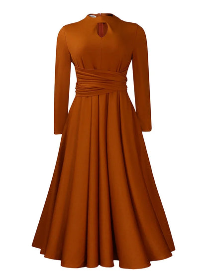 Trendy long Dashiki dress for women by Wmstar, featuring a slim fit and slight stretch for a flattering silhouette, captured in radiant Ankara fabric.