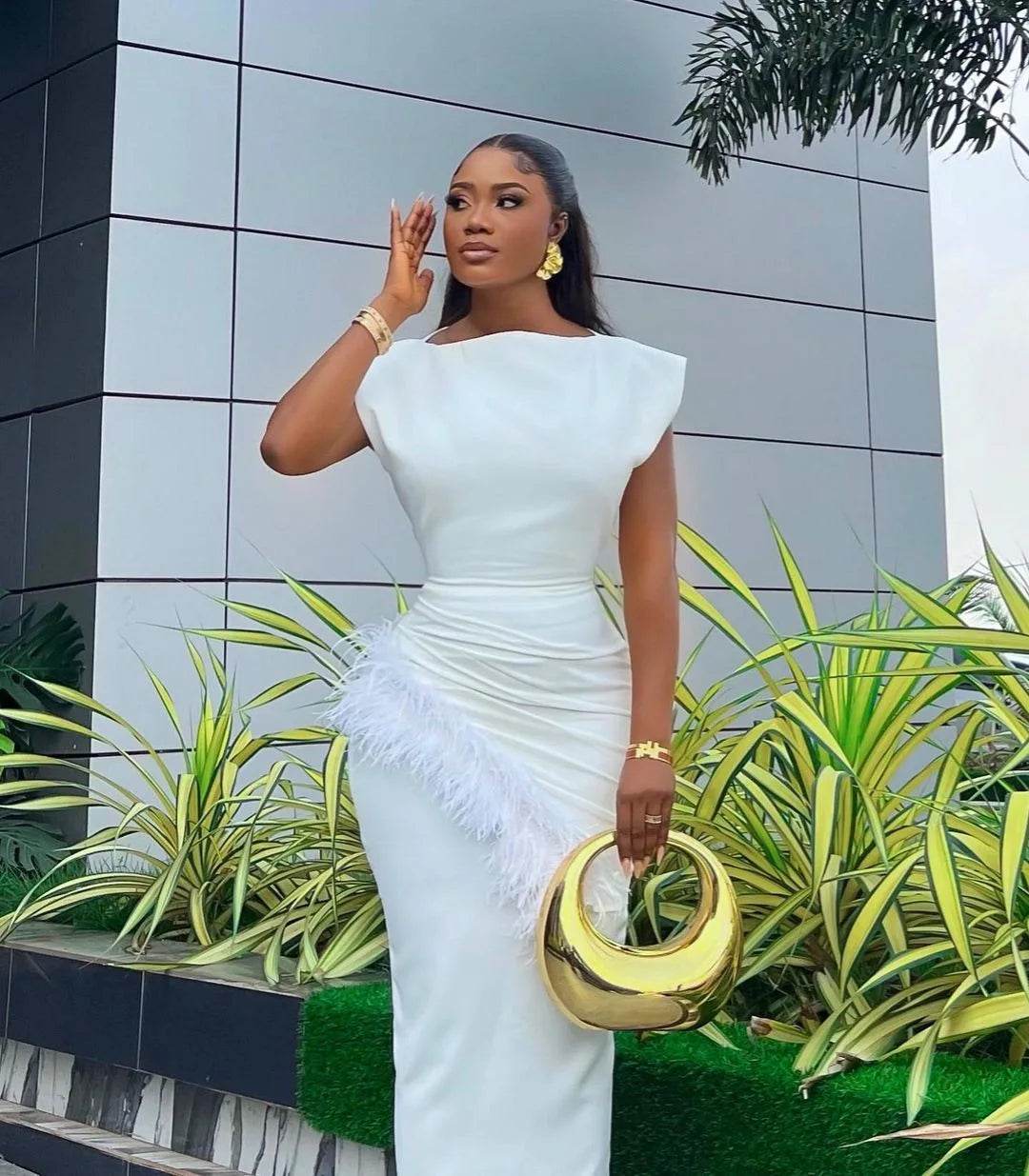 Stylish women's office lady dress with a graceful ankle length cut, featuring a refined O neck pullover and slim fit design, decorated with delicate feather accents for a touch of elegance.