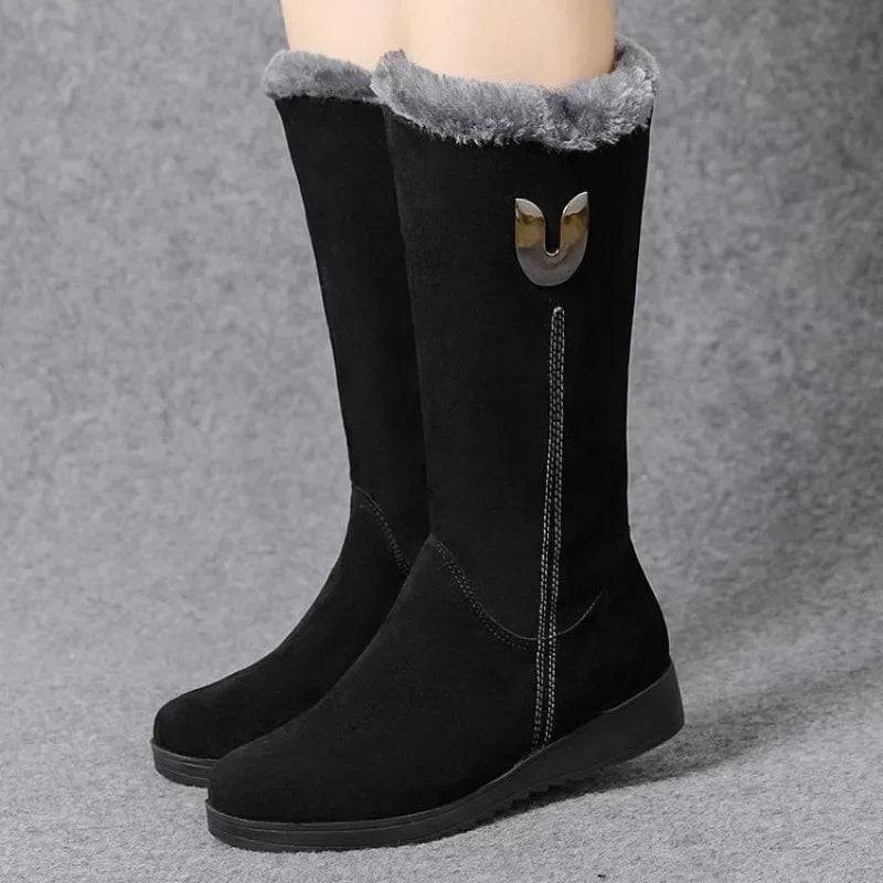 Elegant women's warm high fur boots in khaki, showcasing a chunky mid-calf design with zipper closure for winter luxury.