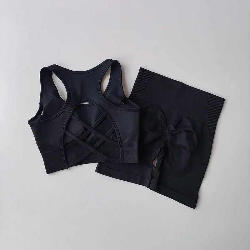Elegant women's seamless activewear showcasing a sexy sport bra paired with high-waisted shorts, ideal for yoga and high-performance workouts.