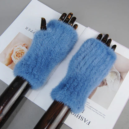 Close-up of luxurious mink fur texture on women's half finger gloves, combining fashion and warmth for the modern woman.