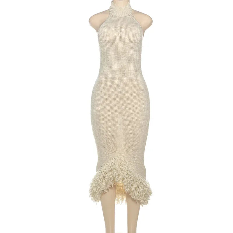 Fashion-forward sleeveless tassel dress by CM.YAYA, ideal for spring/summer events, radiating elegance and confidence.