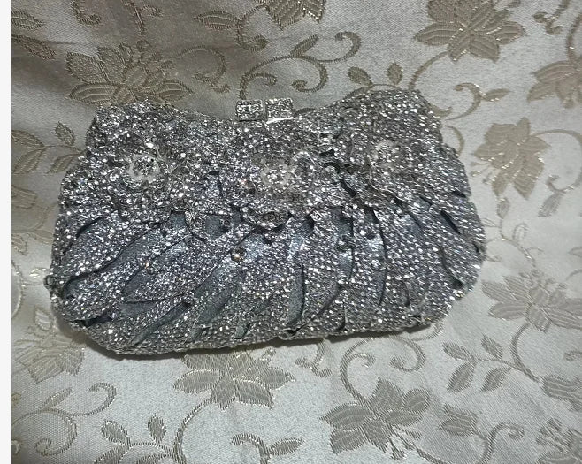 Lavish women's rhinestone evening clutch bag, combining functionality and elegance, perfect accessory for any formal outfit.