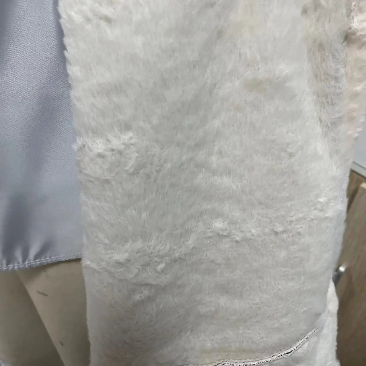 Back view showcasing the sleek design of a women's luxury faux leather jacket.