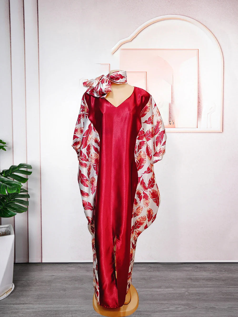 Luxury African Muslim fashion caftan dress in elegant orange and beige hues, perfect for evening parties, embracing cultural aesthetics and comfort through its one size fits all design.