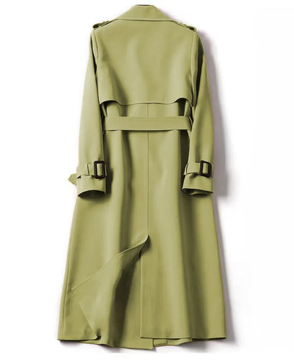 Close-up view of luxury double breasted trench coat for women featuring functional pockets, designed for autumn and winter seasons, embodying an elegant streetwear style.