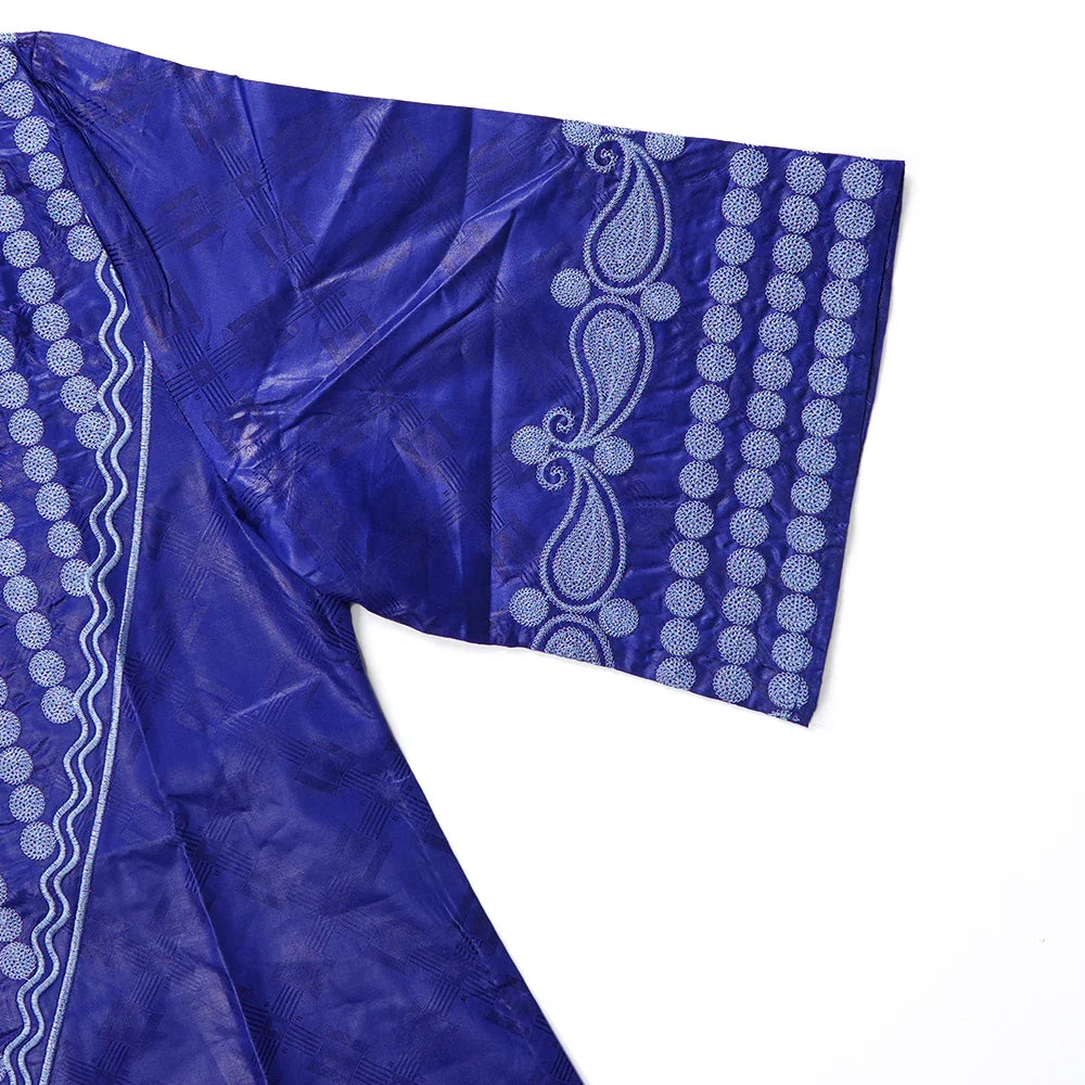 Side view of an elegant African dress by H&D, displaying refined craftsmanship and sophisticated design for women.