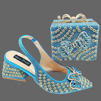 QSGFC Sky Blue Italian Design High Heel Clutch Pumps adorned with Full Diamonds, showcasing a luxurious look, perfect for elegant parties, sizes 38-43.