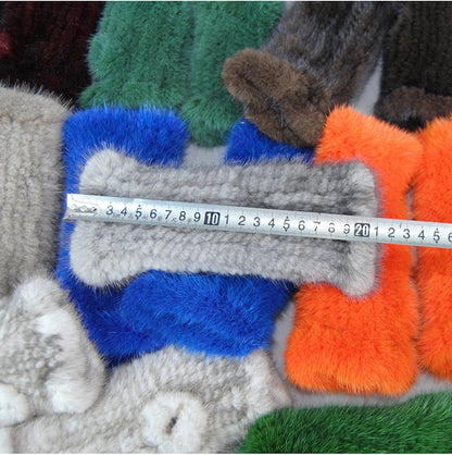 Elegant half-finger gloves crafted from genuine mink fur, perfect for a luxurious winter look.