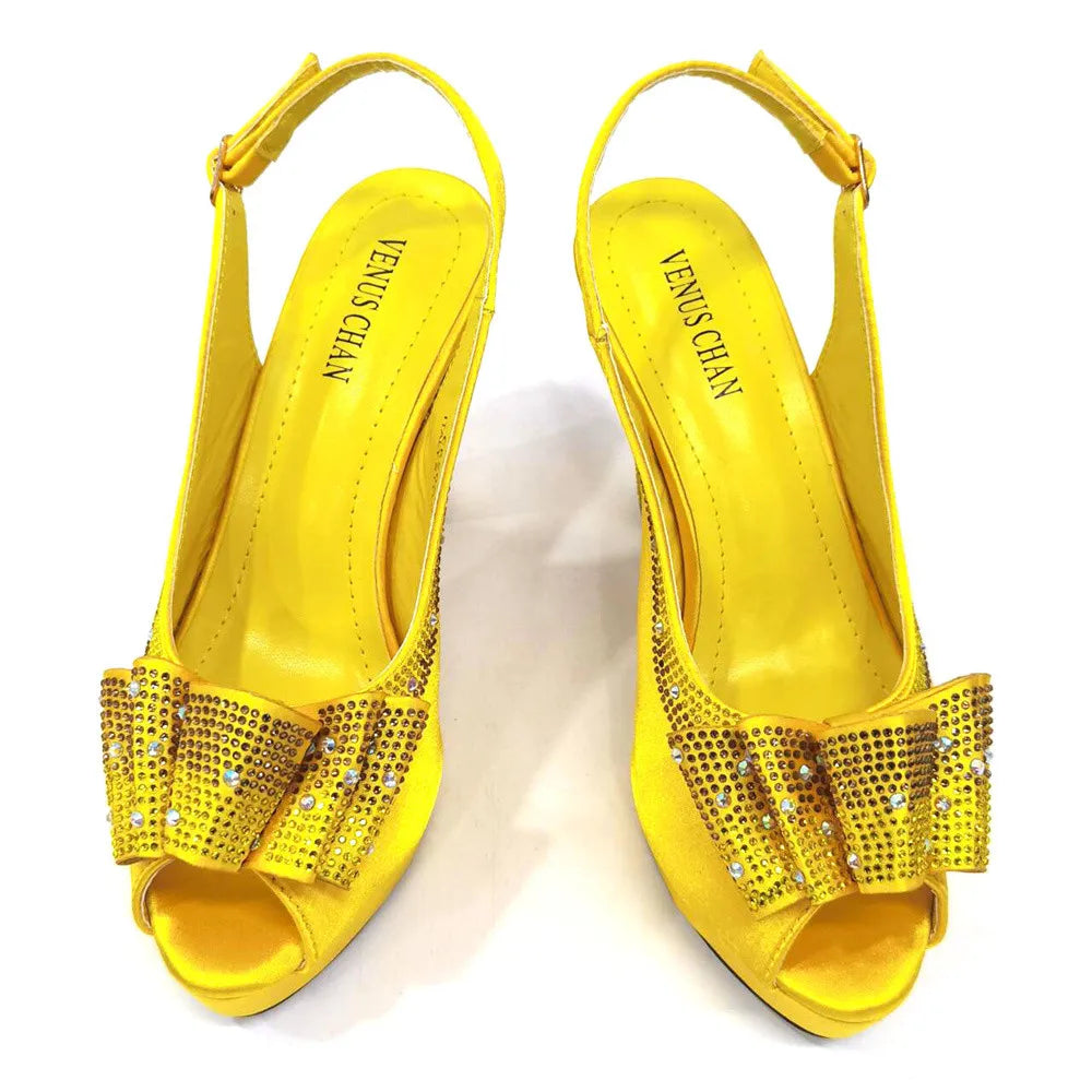 Sophisticated close-up of the luxurious yellow beaked toe cap pump, highlighting its bling fashion element and superior craftsmanship for women's high fashion.