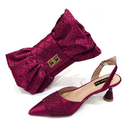 Luxurious wine colour heeled shoes for Nigerian women, elegantly paired with a rhinestone handbag set, perfect for parties and weddings. Available in sizes 37-43, showcasing a sophisticated design ideal for any formal occasion.
