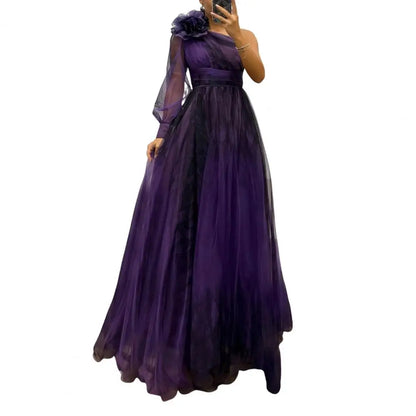 Exquisite Women's evening dress featuring a graceful pleated design, long sleeve, and slit, embodying elegance and sophistication for special events.
