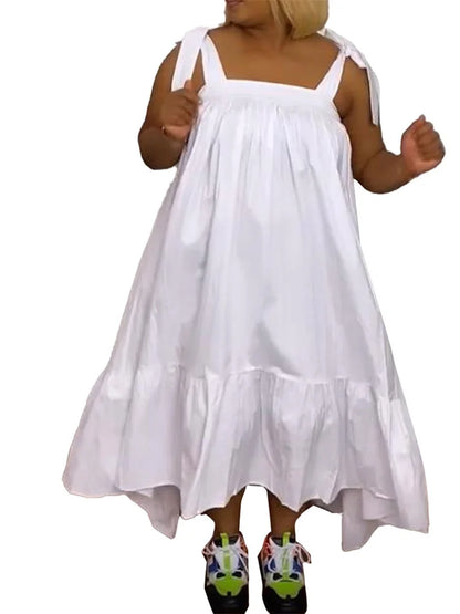 Sophisticated Wmstar Plus Size Maxi Dress in rich green, highlighting the flattering loose fit and sleeveless silhouette, ideal for fashion-forward women.