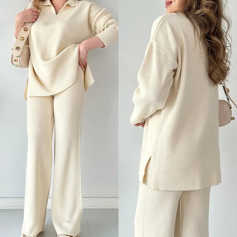 Elegant women's oversized knitted 2-piece set featuring a solid v-neck pullover paired with wide-leg pants, perfect for a chic casual look.