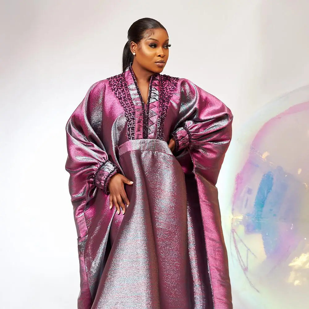 Close-up view of the luxurious rhinestone embellishments on a V-neck turkey dress, highlighting the exquisite craftsmanship tailored for women.