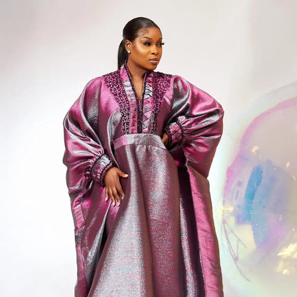 Close-up view of the luxurious rhinestone embellishments on a V-neck turkey dress, highlighting the exquisite craftsmanship tailored for women.