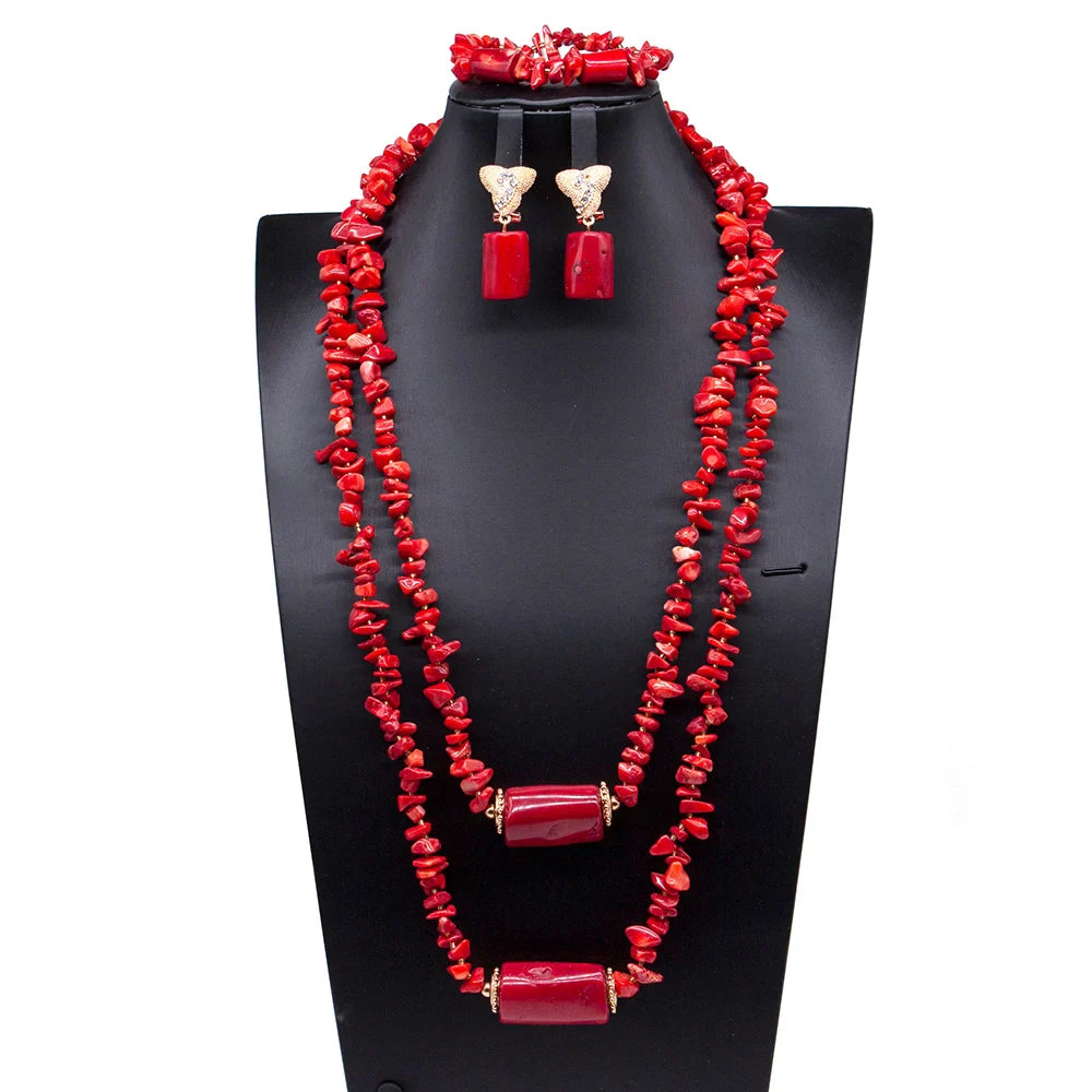 Stylish display of the Luxury African Beads Jewelry Set including the statement necklace, earrings, and bracelet, highlighting the vibrant artificial coral materials and luxurious craftsmanship.
