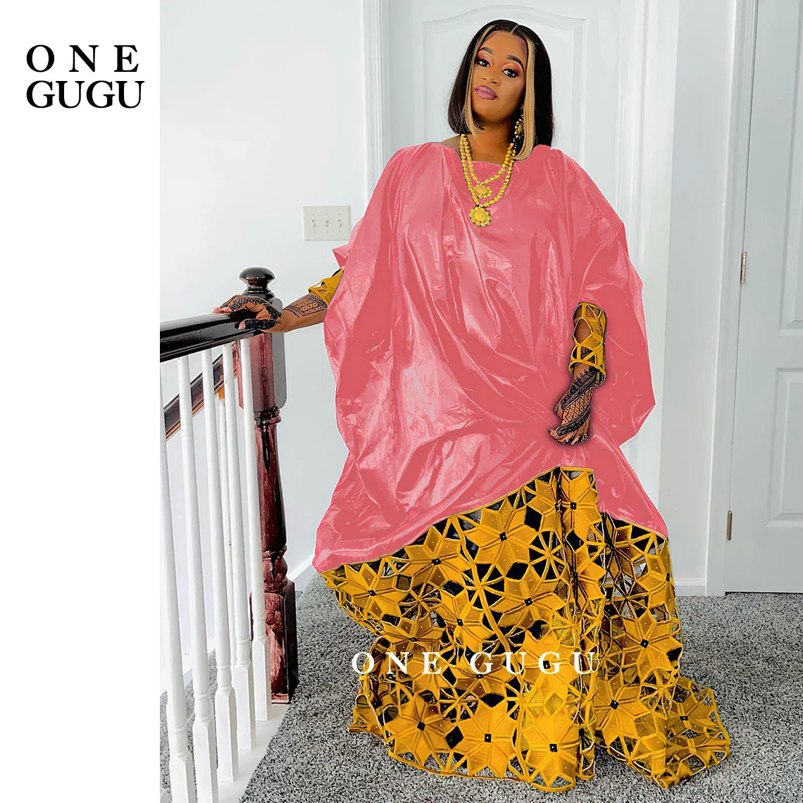 Stylish display of the African Dashiki gown, illustrating fabric texture and design, a blend of traditional and modern fashion for sophisticated women.