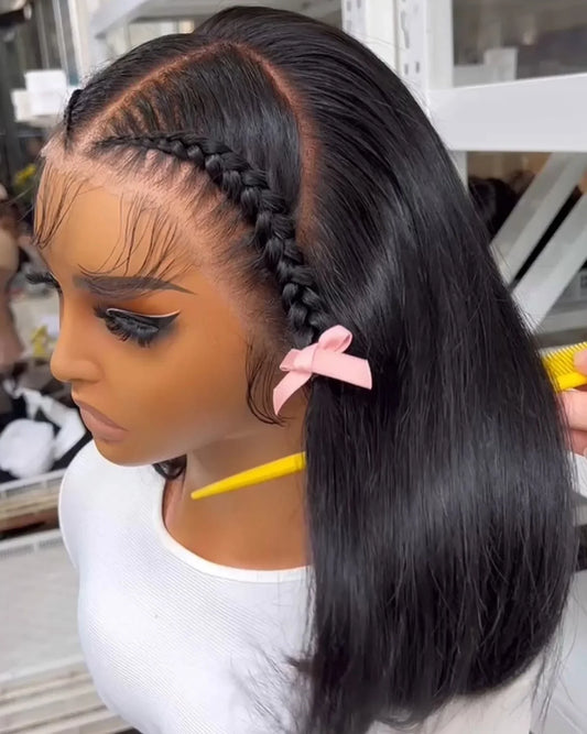 Luxurious short bob black blunt cut synthetic wig with a 13X4 HD lace frontal and straight pre-plucked hairline, ideal for a glamorous and sophisticated look.