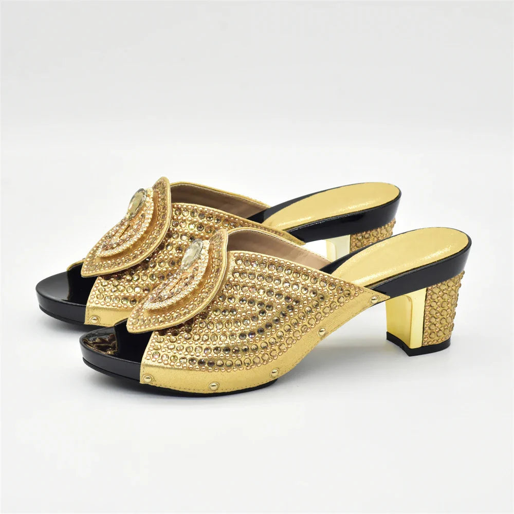 Glamorous black Italian shoe and bag combination, featuring exquisite rhinestone decoration, ideal for sophisticated women's fashion.