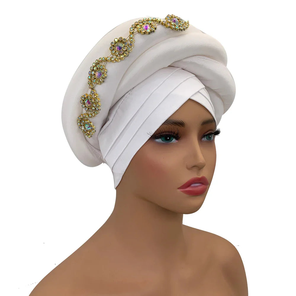 Elegant model wearing the Gorgeous Twisted Braid Turban Cap in raw silk, showcasing its stunning design and vibrant style for formal occasions.