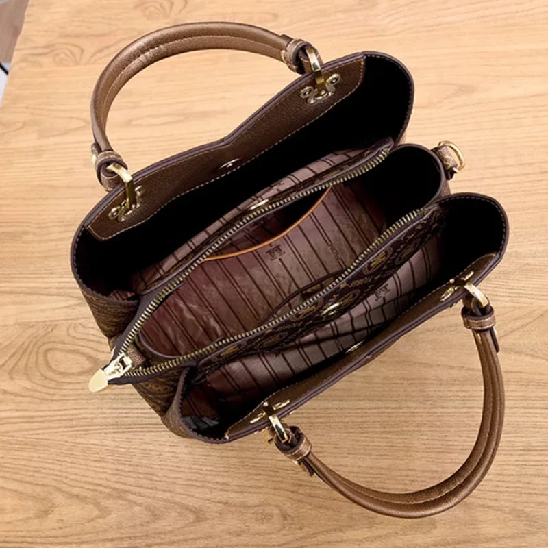 Close-up view of luxurious faux leather texture in ivory white, showcasing the quality of the women's elegant tote bag set.