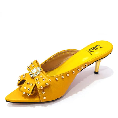 Elegant and chic summer shoes with super high thin heels, combining comfort and style for the modern woman.