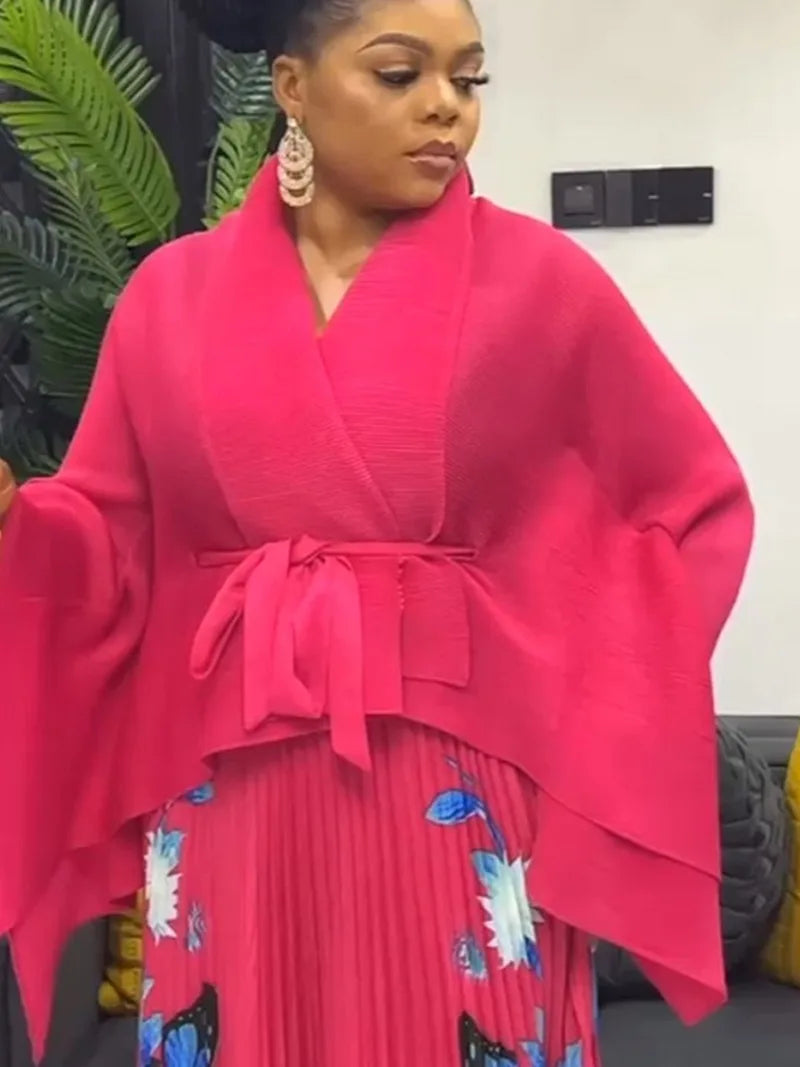 EGRM Luxury Plus Size Autumn Skirt Set featuring a batwing sleeve top and a pleated print skirt, perfect for stylish and comfortable occasions.