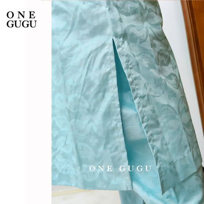 Fashionable image of the complete 2-piece African clothing set, capturing the exquisite craftsmanship and vibrant colour of the fabric.