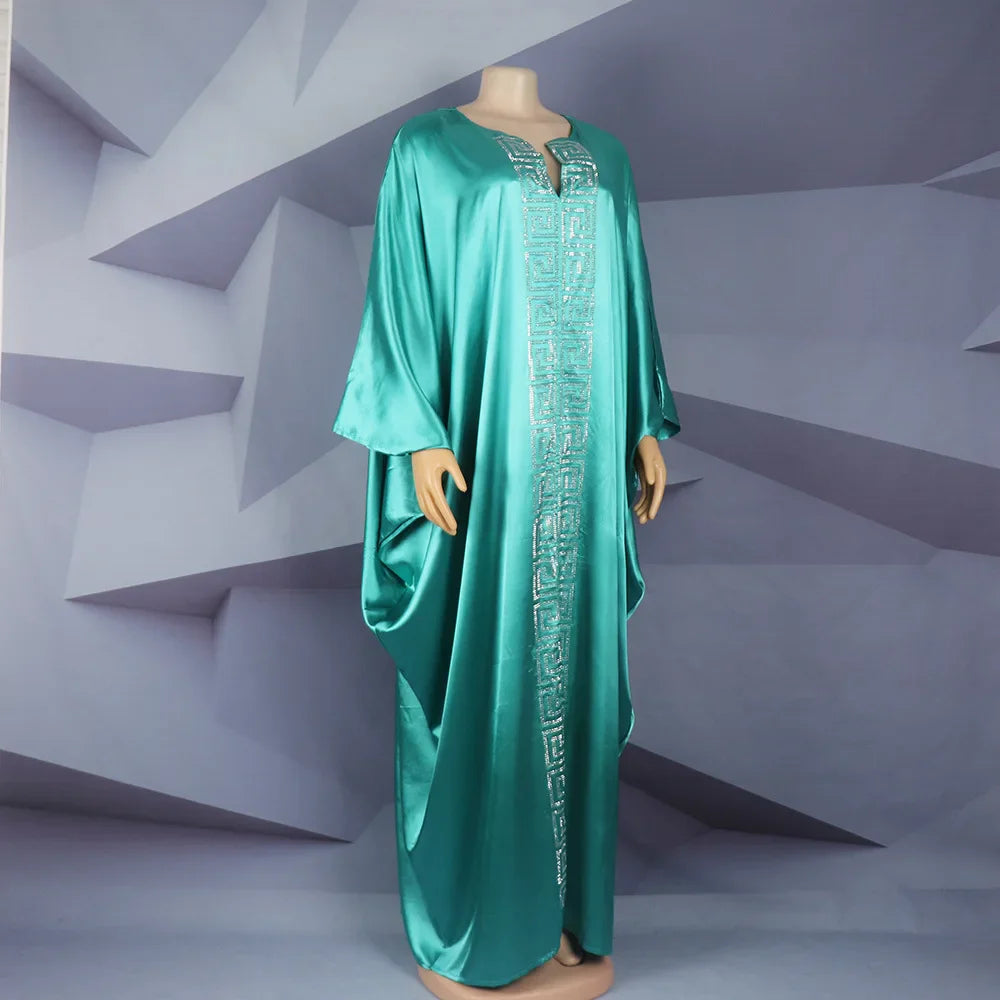 Full view of the elegant African women's abaya dress, ideal for Muslim style gatherings with a flowing silhouette and luxurious fabric.