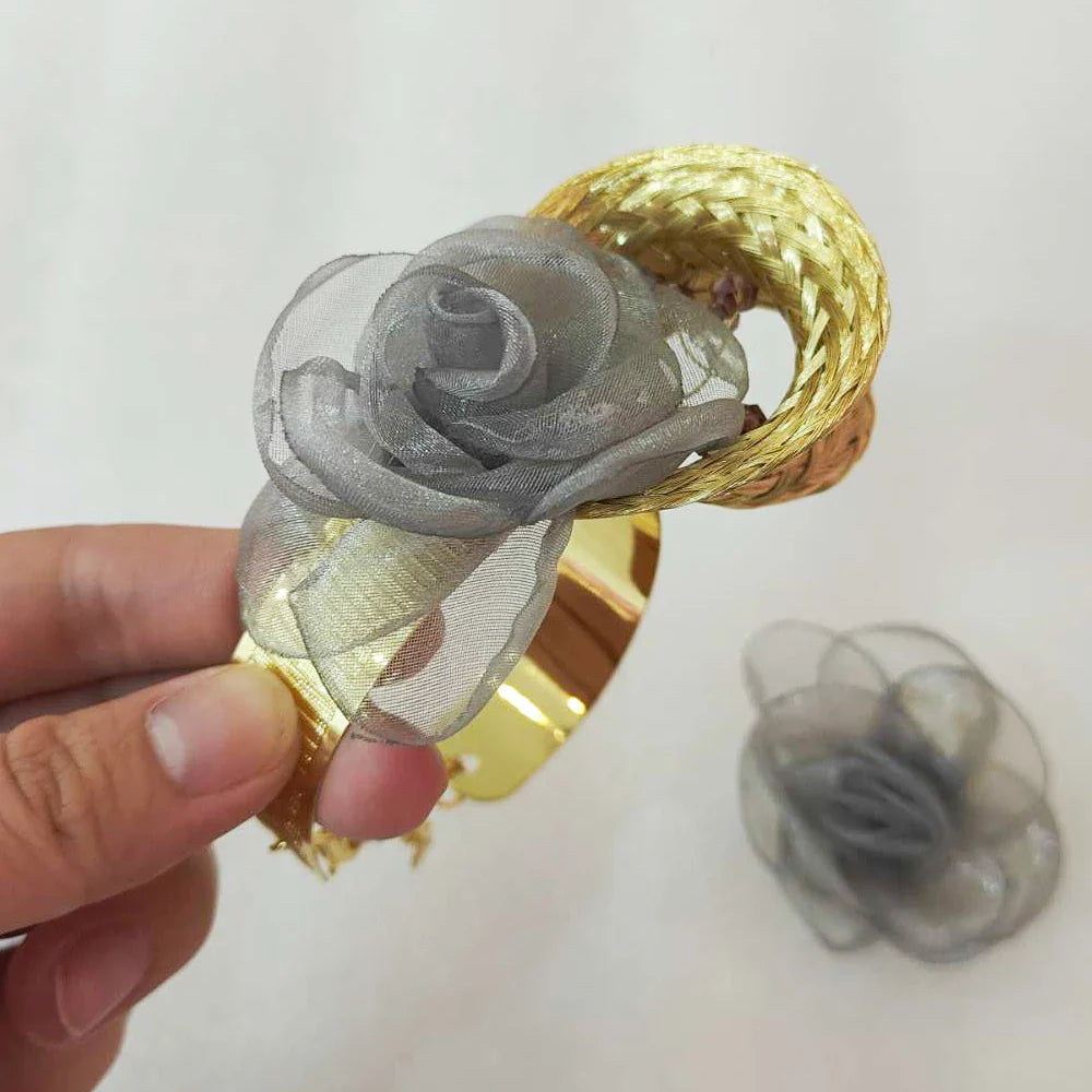 Elegant gold bracelet and ring from a women's jewelry collection, offering a touch of sophistication and style for festive occasions.