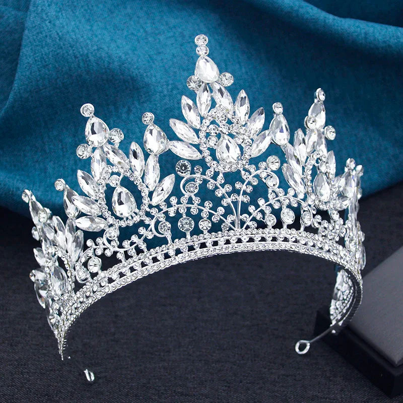 Stylish long hair adorned with the lime green crystal queen crown tiara, highlighting its vintage elegance for bridal hairstyles.