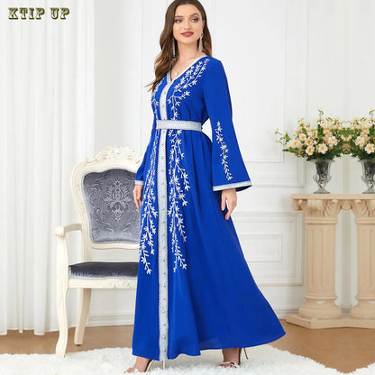 Close-up view of the exquisite sequins adorning the golden velvet Moroccan Dubai dress, highlighting its luxurious craftsmanship suitable for special occasions.