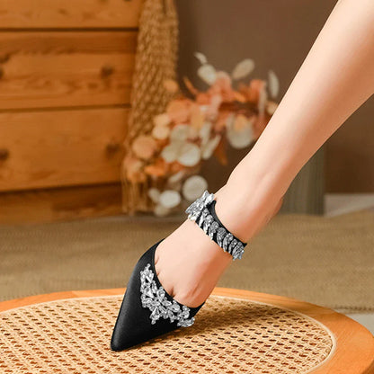 Close-up of women's silk rhinestone low heel mules showcasing exquisite craftsmanship and stylish design for summer wear.