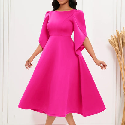 Stylish model showcasing the refined silhouette of a women's A-Line evening dress for summer, accentuated by soft petal sleeves and a natural waistline.