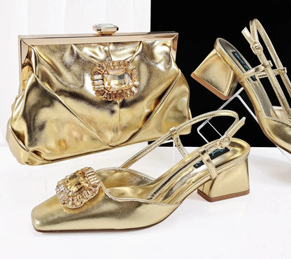 Sophisticated coffee handbag with a long chain shoulder strap, elegantly paired with matching rhinestone pumps, ideal for women's formal attire.