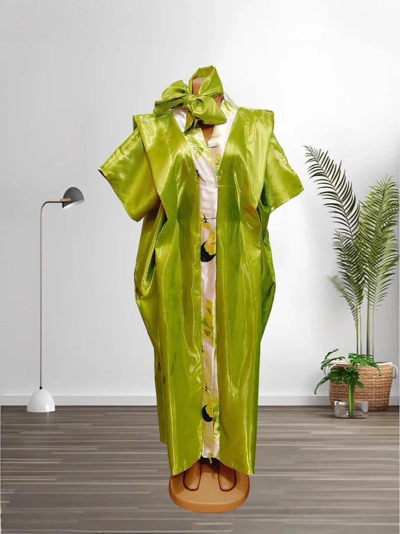 Amazing display of the luxury caftan dress in vibrant orange and beige colors, highlighting the unique craftsmanship and timeless appeal of African Muslim fashion for women.